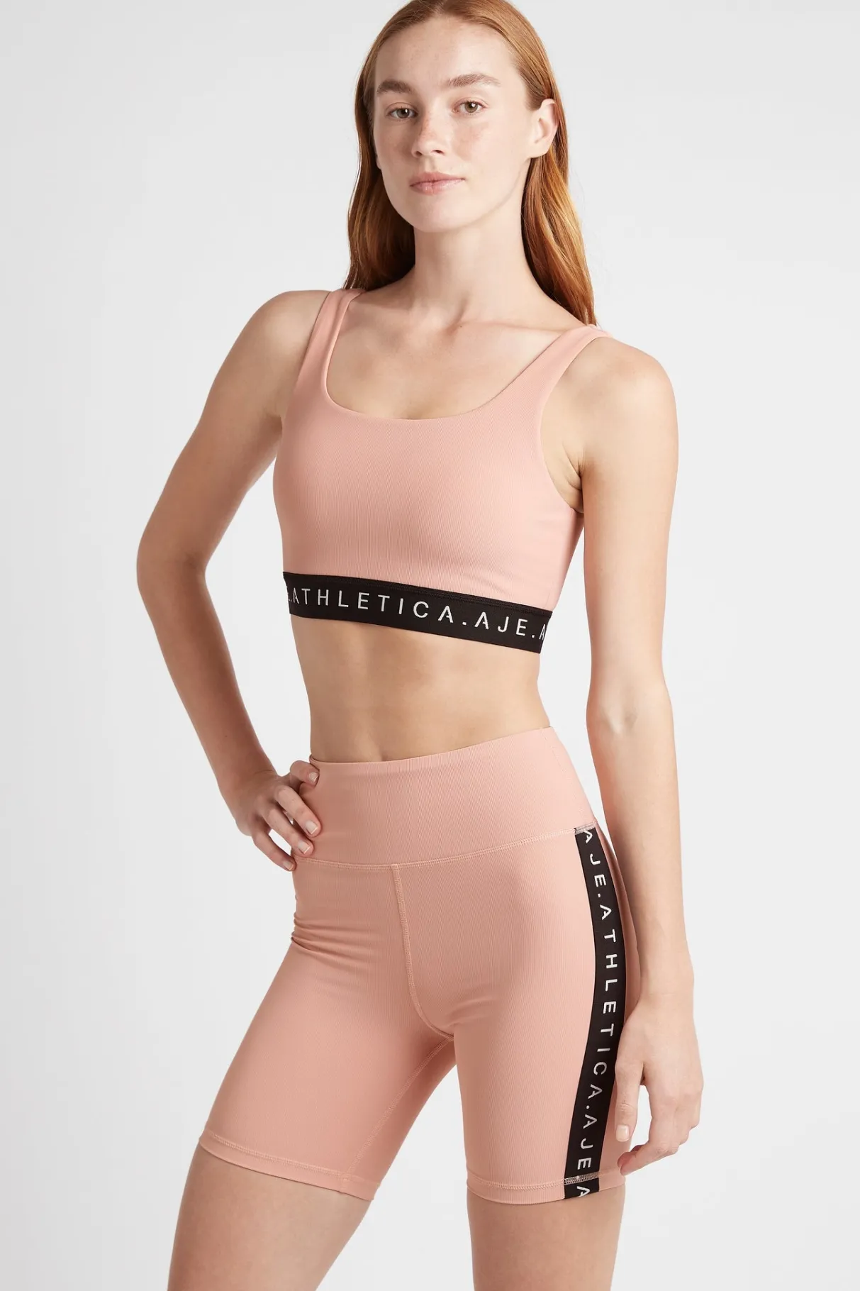 essential_mid_length_bike_shorts__2.webp Fashion Aje ATHLETICA Essential Mid Length Bike Shorts 601 Sunset Pink