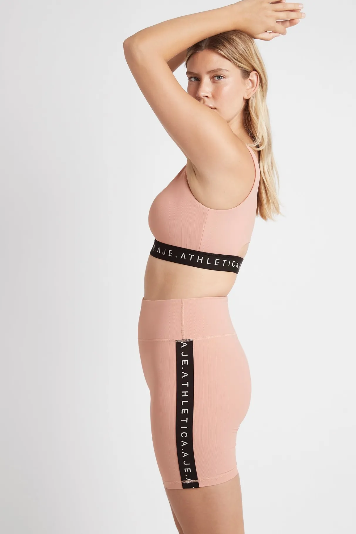 essential_mid_length_bike_shorts__7.webp Fashion Aje ATHLETICA Essential Mid Length Bike Shorts 601 Sunset Pink