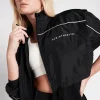 Sale Aje ATHLETICA Essential Windbreaker Jacket 718 Black/Light Ivory
