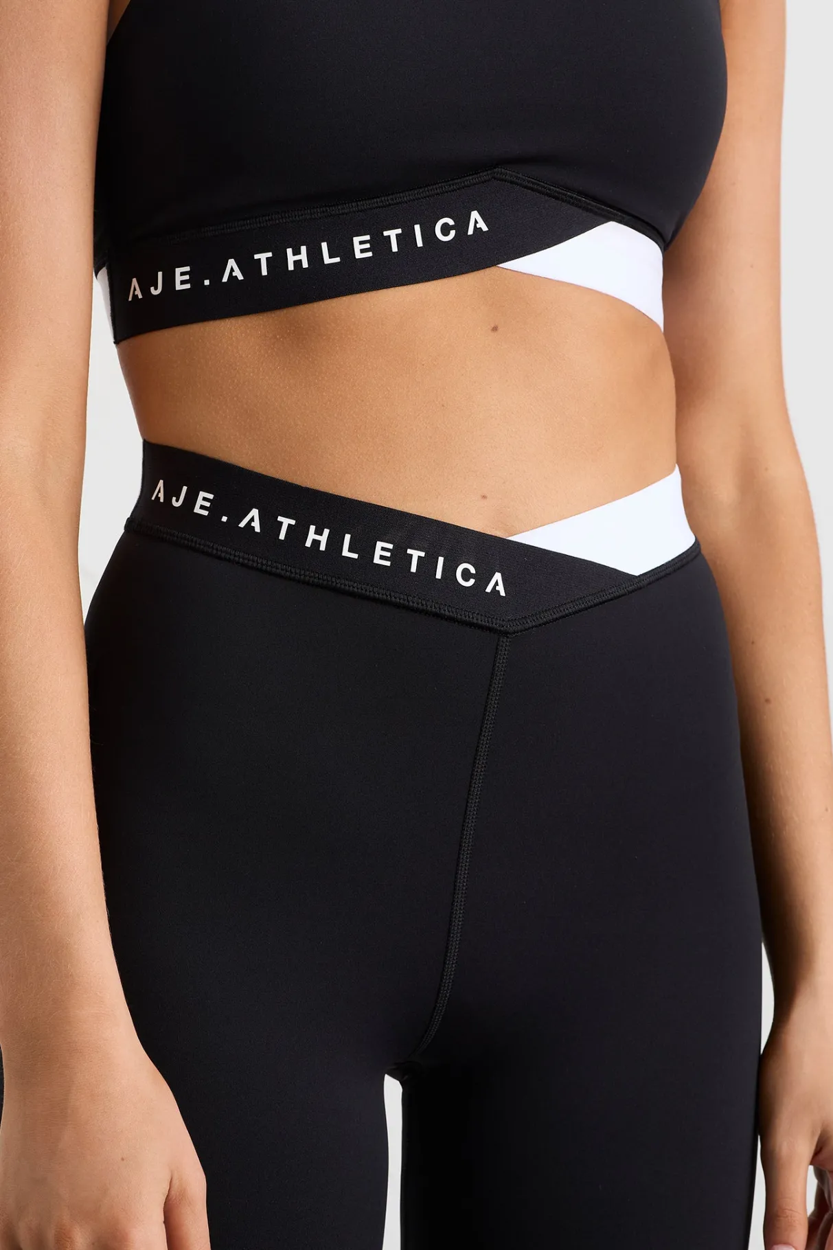 full_length_cross_leggings__3.webp Shop Aje ATHLETICA Full Length Cross Leggings 249 Black/White