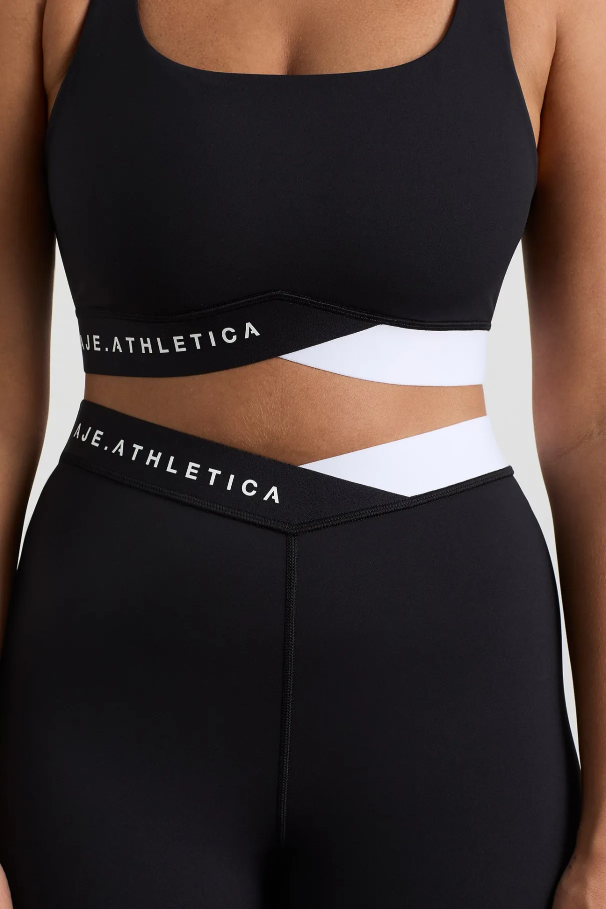 full_length_cross_leggings__7.webp Shop Aje ATHLETICA Full Length Cross Leggings 249 Black/White