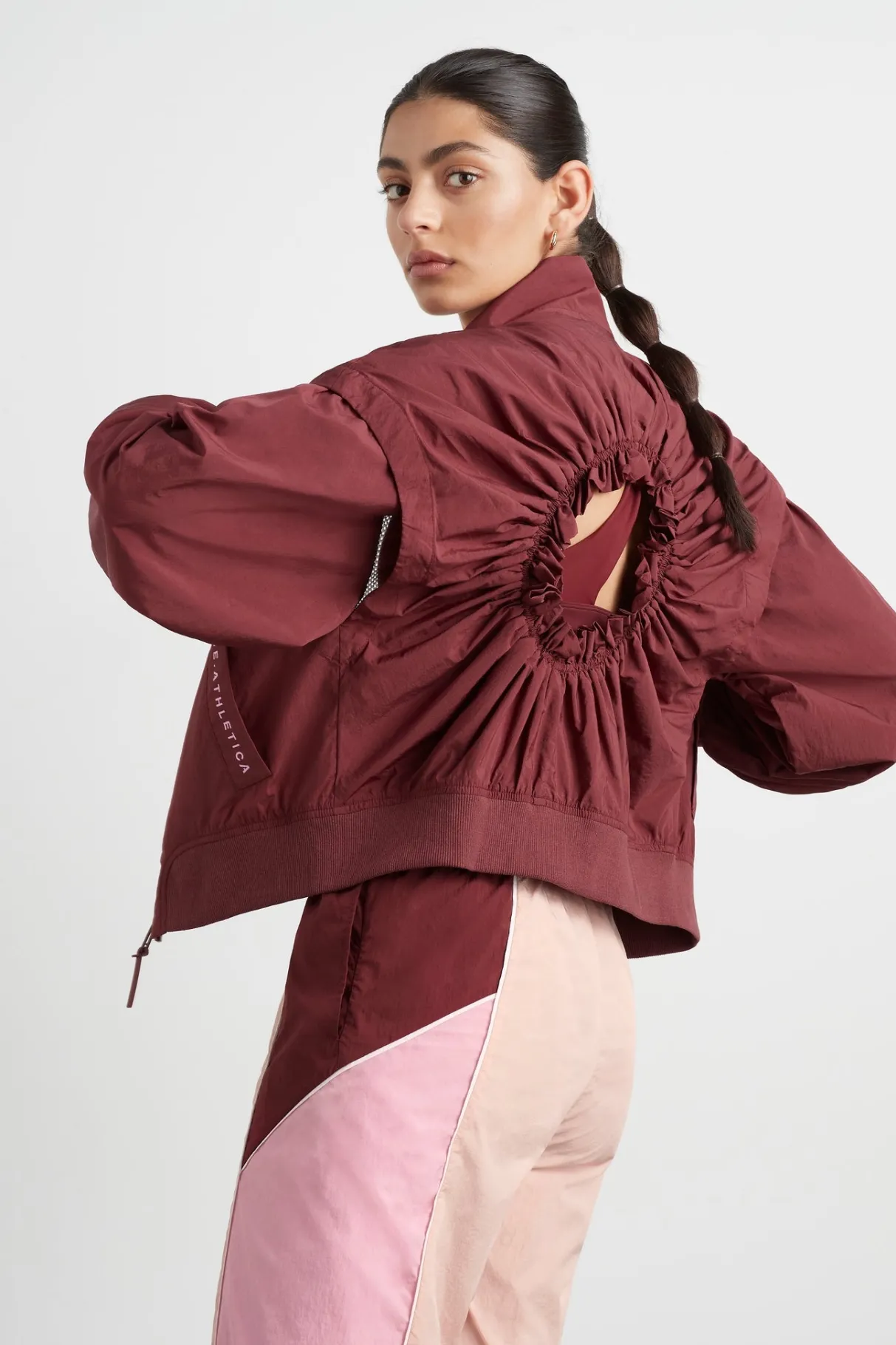 gathered_cut_out_jacket__0.webp Best Sale Aje ATHLETICA Gathered Cut Out Jacket 737 Burnt Burgundy/Bonbon Pink