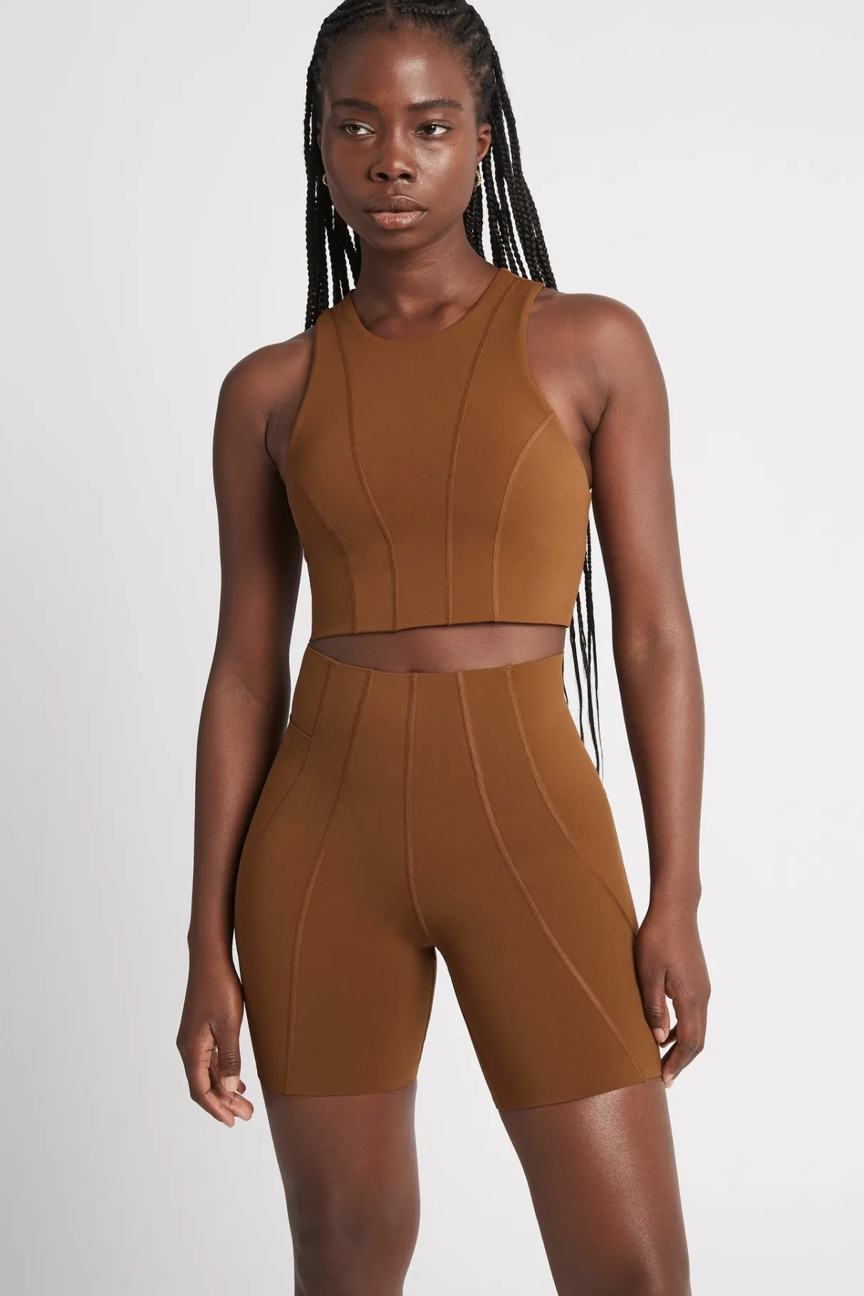 high_rise_mid_length_embossed_bike_short__0.webp Discount Aje ATHLETICA High Rise Mid Length Embossed Bike Short 615 Coffee/Gold