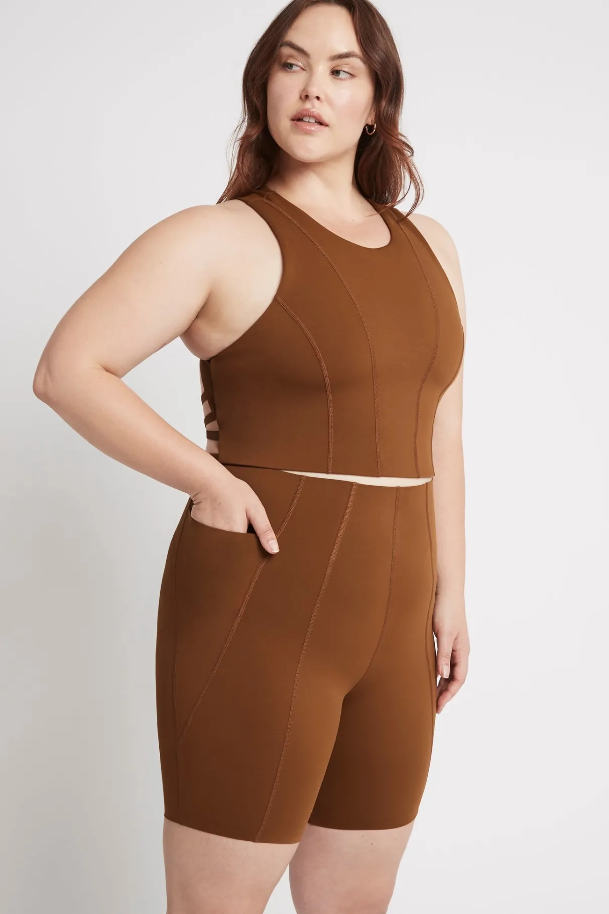 high_rise_mid_length_embossed_bike_short__12.webp Discount Aje ATHLETICA High Rise Mid Length Embossed Bike Short 615 Coffee/Gold