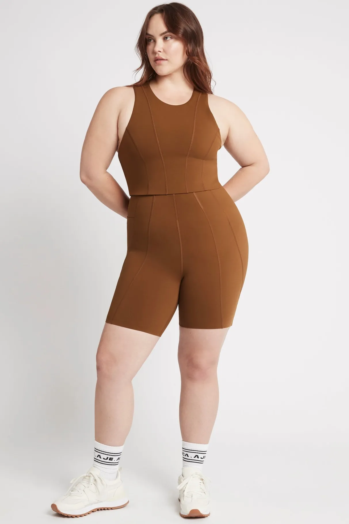 high_rise_mid_length_embossed_bike_short__14.webp Discount Aje ATHLETICA High Rise Mid Length Embossed Bike Short 615 Coffee/Gold