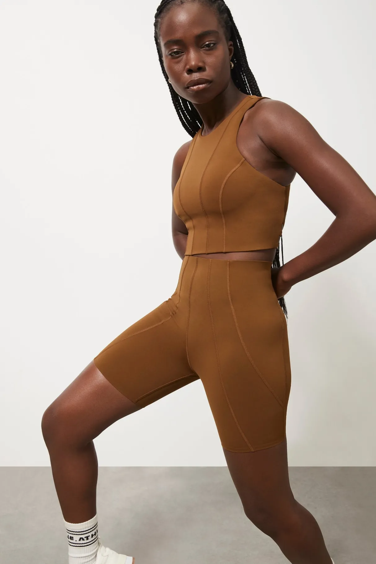 high_rise_mid_length_embossed_bike_short__2.webp Discount Aje ATHLETICA High Rise Mid Length Embossed Bike Short 615 Coffee/Gold