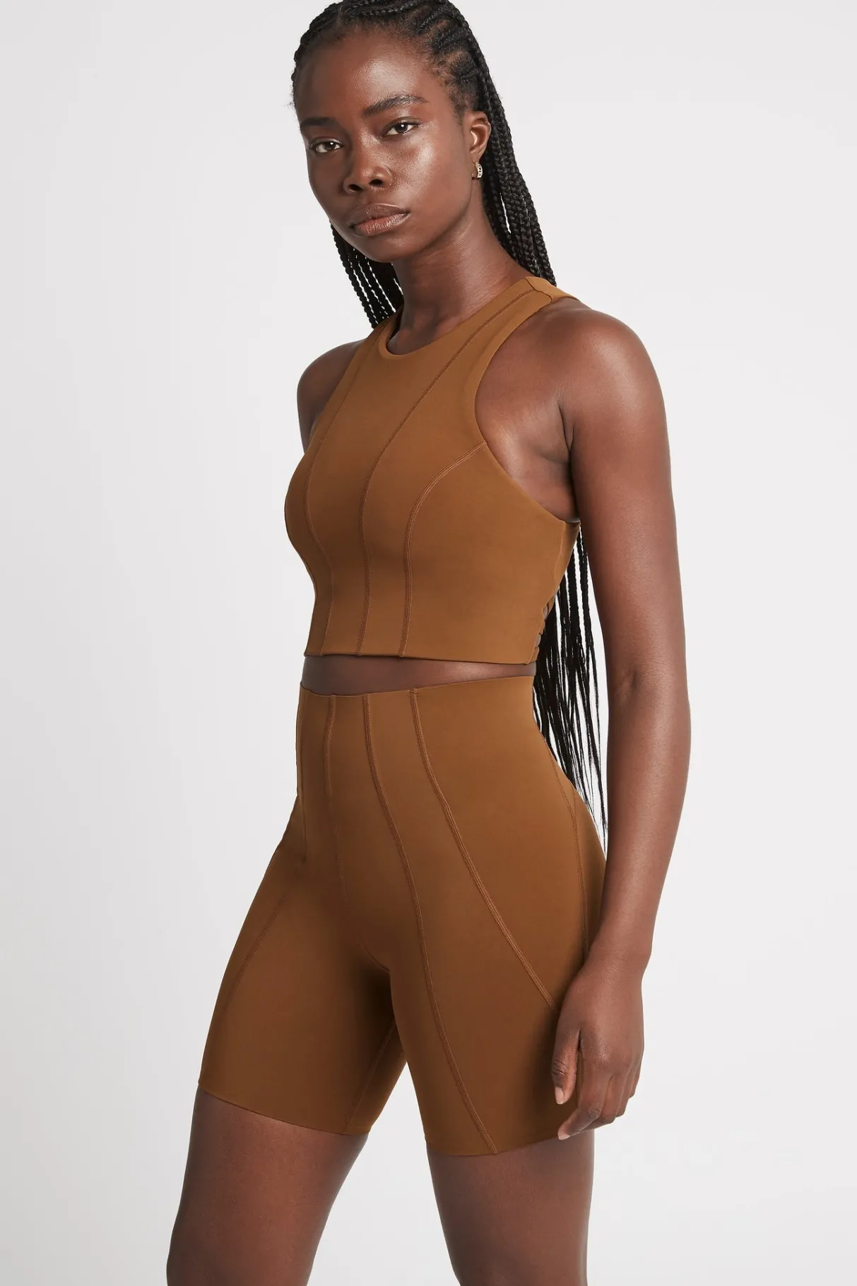 high_rise_mid_length_embossed_bike_short__3.webp Discount Aje ATHLETICA High Rise Mid Length Embossed Bike Short 615 Coffee/Gold