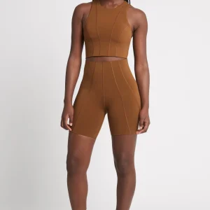 Discount Aje ATHLETICA High Rise Mid Length Embossed Bike Short 615 Coffee/Gold