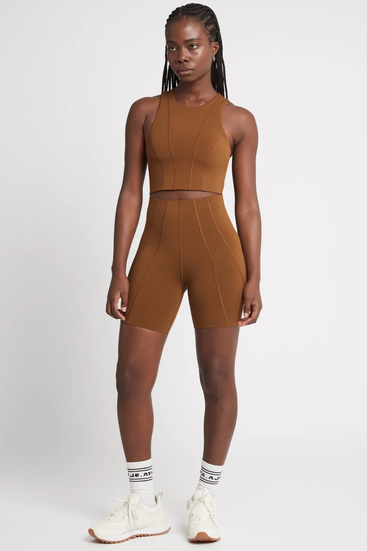 high_rise_mid_length_embossed_bike_short__5.webp Discount Aje ATHLETICA High Rise Mid Length Embossed Bike Short 615 Coffee/Gold