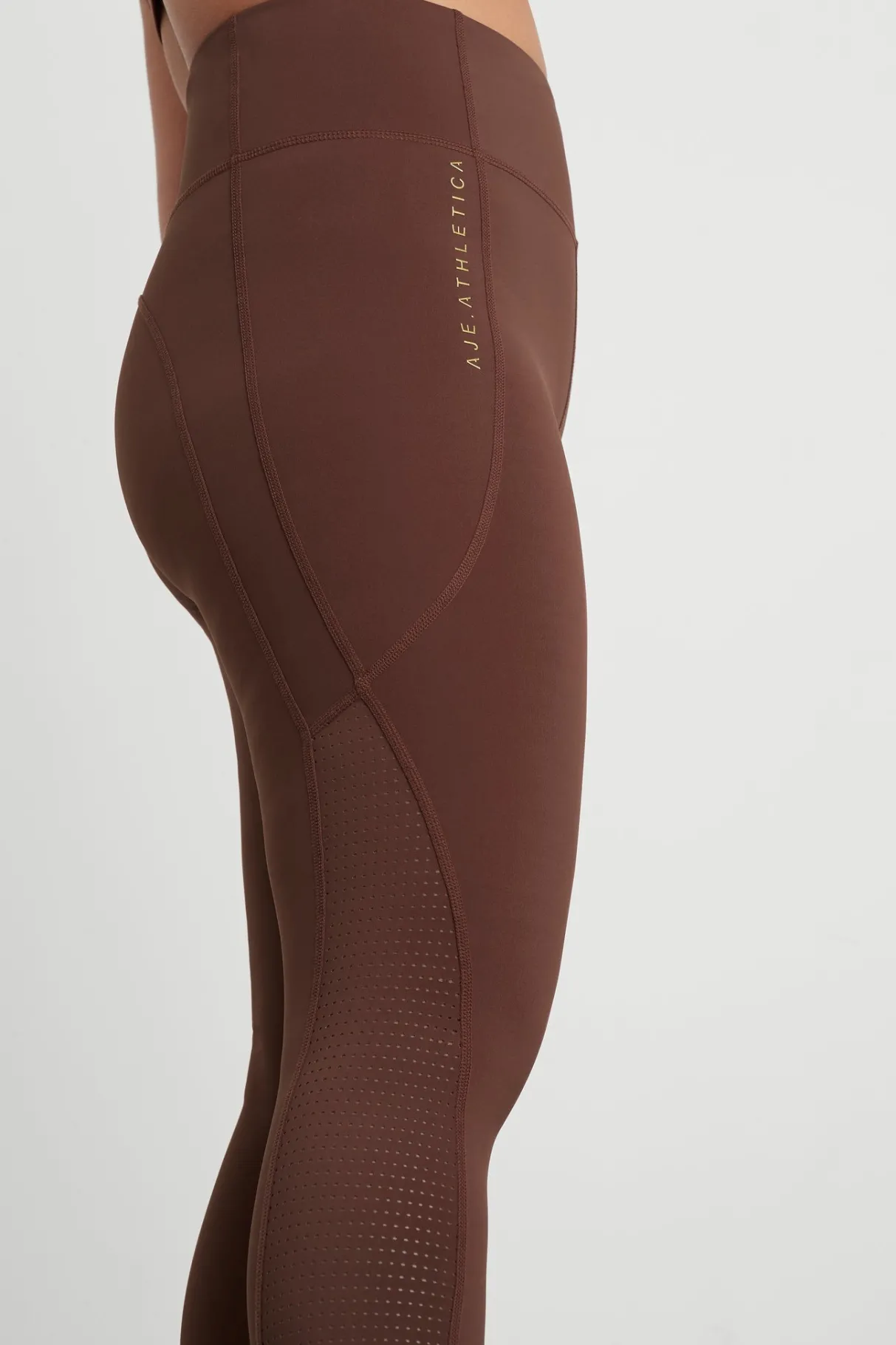 high_rise_perforated_hem_full_length_legging__9.webp Best Aje ATHLETICA High Rise Perforated Hem Full Length Legging 227 Dark Chocolate
