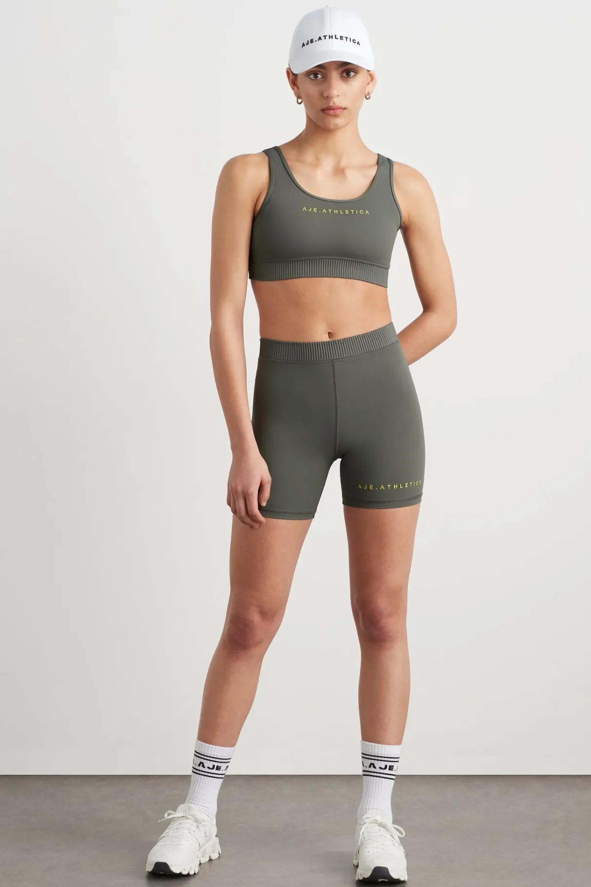 high_rise_pintuck_mid_length_bike_shorts__0.webp Discount Aje ATHLETICA High Rise Pintuck Mid Length Bike Shorts 625 Midnight Grey/Citrus Yellow
