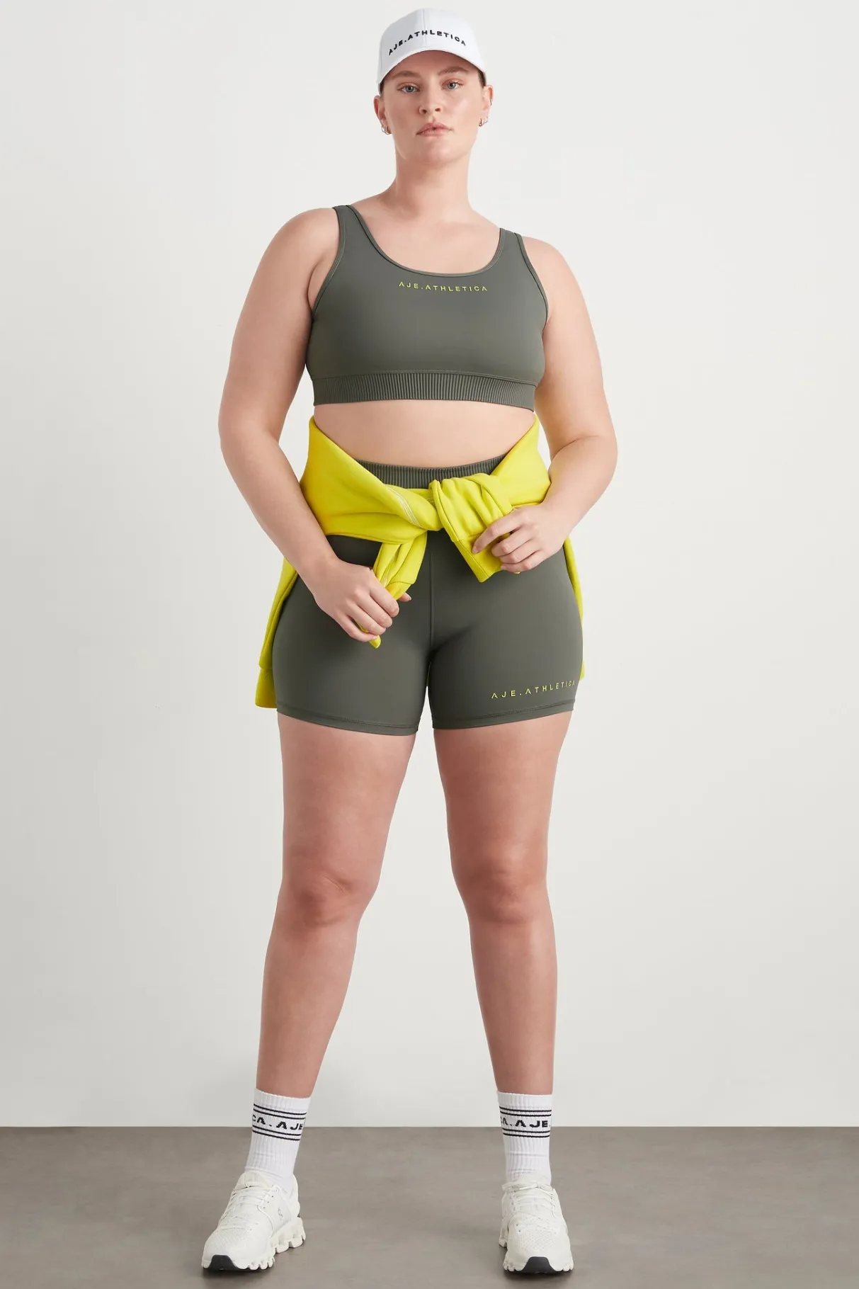 high_rise_pintuck_mid_length_bike_shorts__16.webp Discount Aje ATHLETICA High Rise Pintuck Mid Length Bike Shorts 625 Midnight Grey/Citrus Yellow