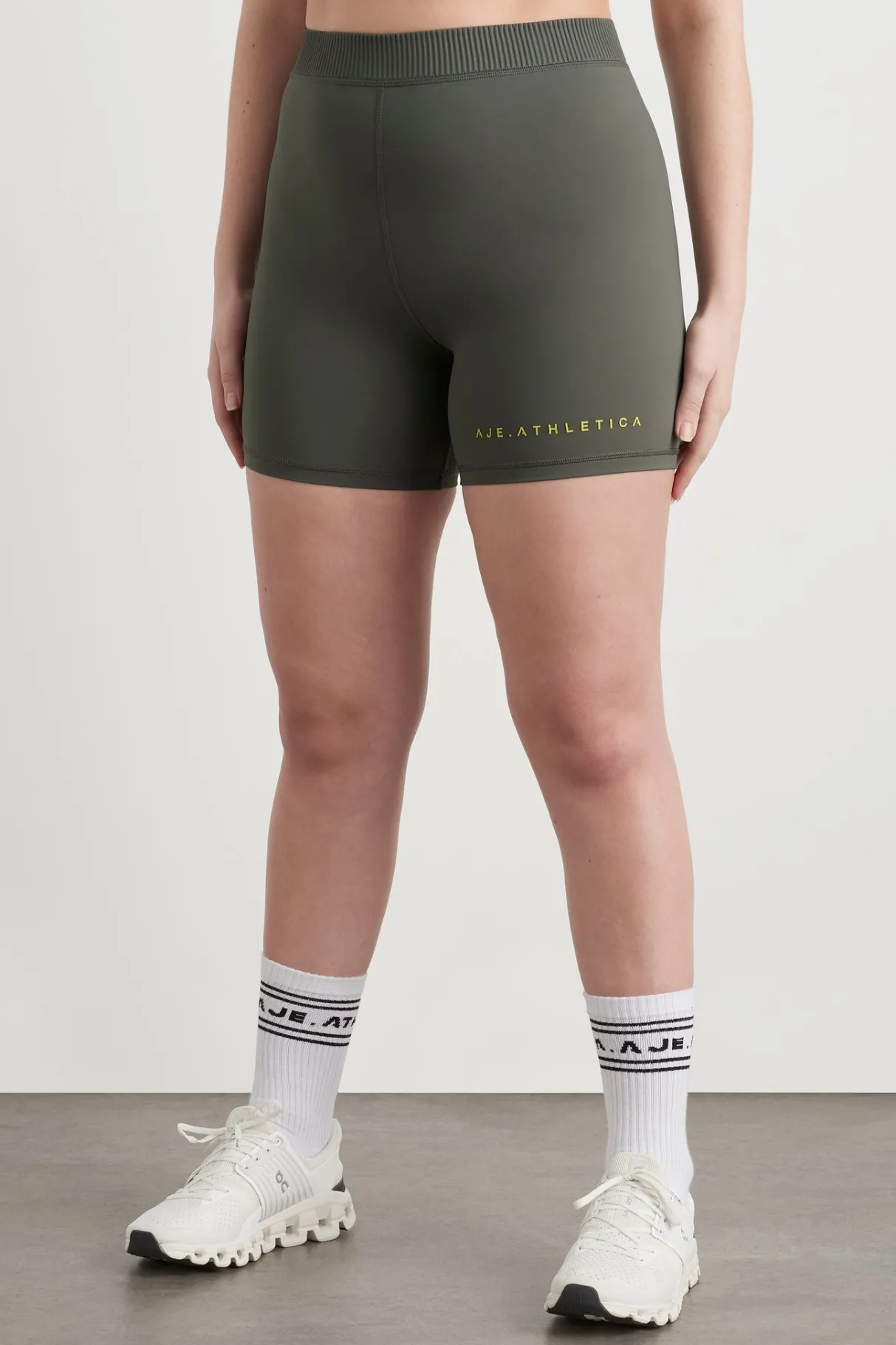 high_rise_pintuck_mid_length_bike_shorts__7.webp Discount Aje ATHLETICA High Rise Pintuck Mid Length Bike Shorts 625 Midnight Grey/Citrus Yellow