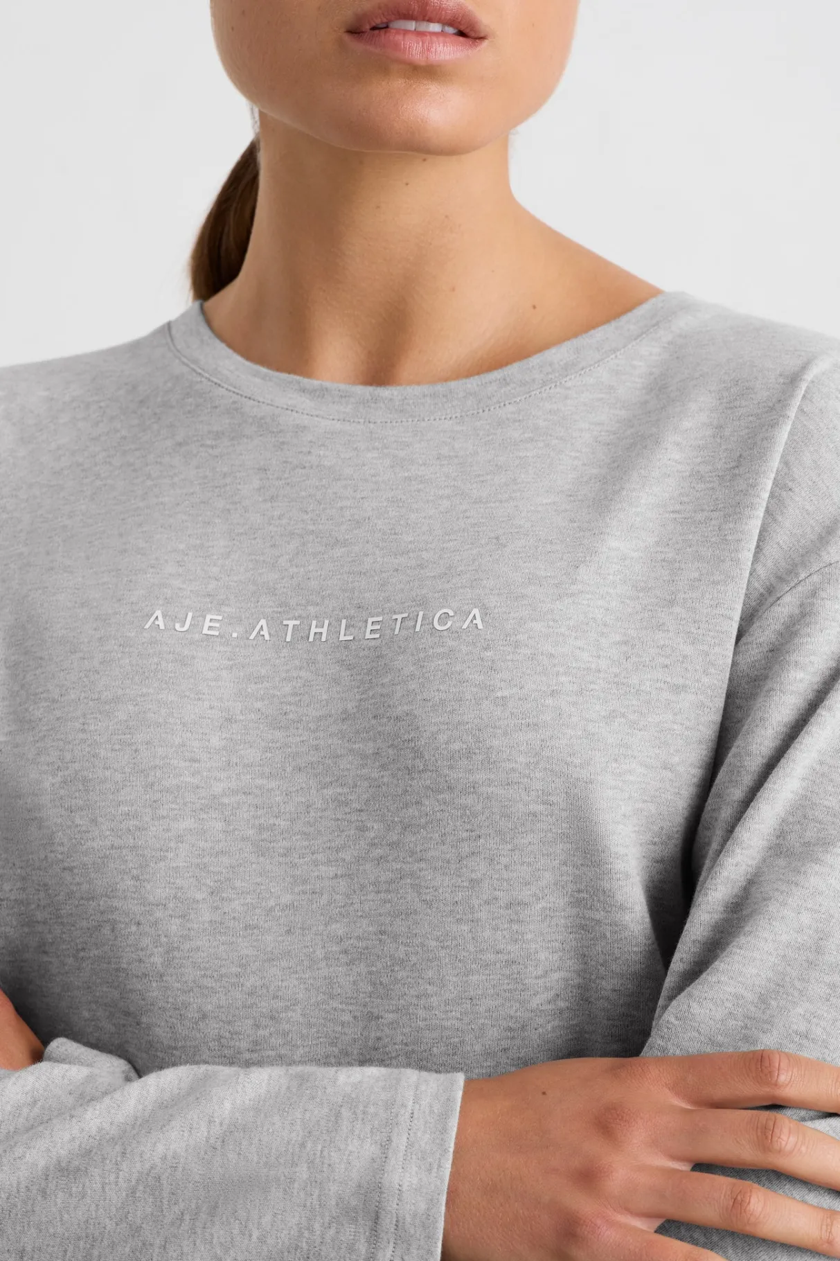 keyhole_drawstring_long_sleeve_tee__2.webp Online Aje ATHLETICA Keyhole Drawstring Long Sleeve Tee 149 Grey Marle