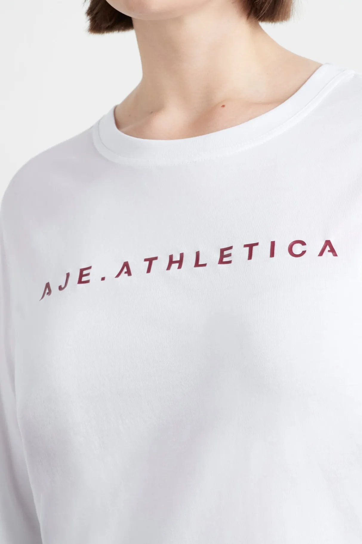 logo_long_sleeve_tshirt__11.webp Online Aje ATHLETICA Logo Long Sleeve T-Shirt 127 White/Burnt Burgundy