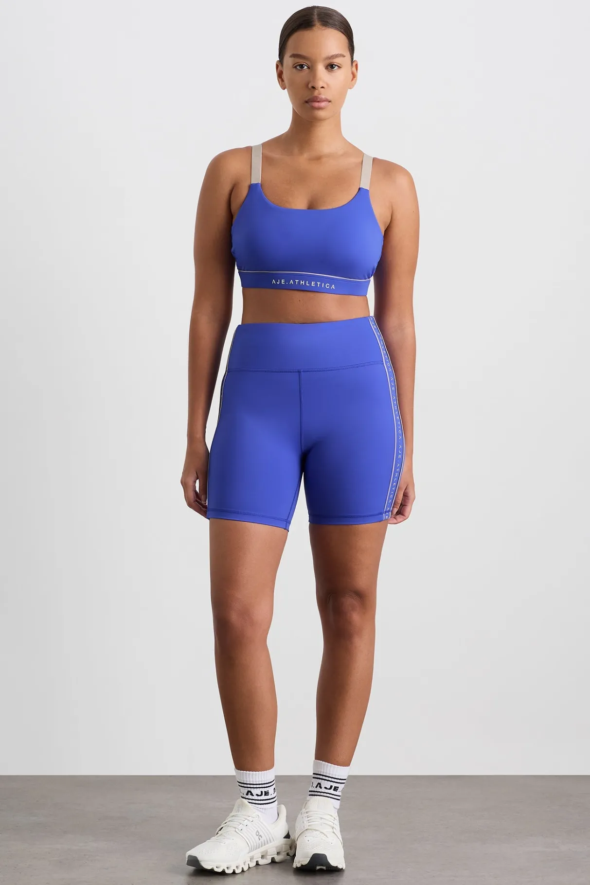 logo_notch_bike_short__6.webp Online Aje ATHLETICA Logo Notch Bike Short 639 Marine Blue Latte Beige