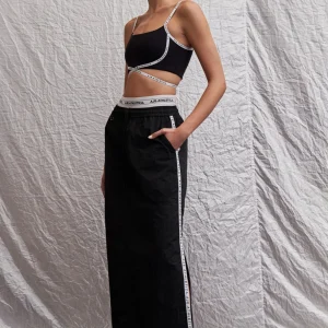 Outlet Aje ATHLETICA Logo Tape Crossover Bra 393 Black/White