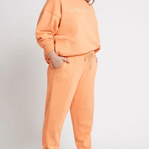 Shop Aje ATHLETICA Logo Trackpants 502 Orange Marle