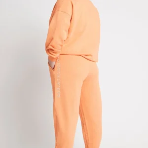 Shop Aje ATHLETICA Logo Trackpants 502 Orange Marle