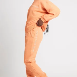 Shop Aje ATHLETICA Logo Trackpants 502 Orange Marle