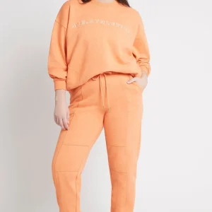 Shop Aje ATHLETICA Logo Trackpants 502 Orange Marle