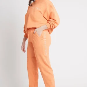 Shop Aje ATHLETICA Logo Trackpants 502 Orange Marle