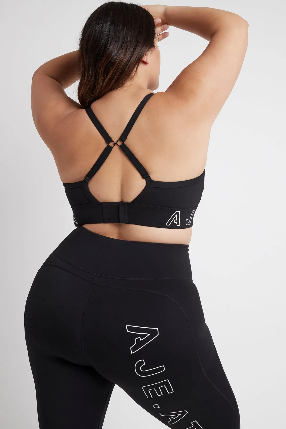 logotape_adjustable_strap_sports_bra__14.webp Outlet Aje ATHLETICA Logotape Adjustable Strap Sports Bra 307 Black/White