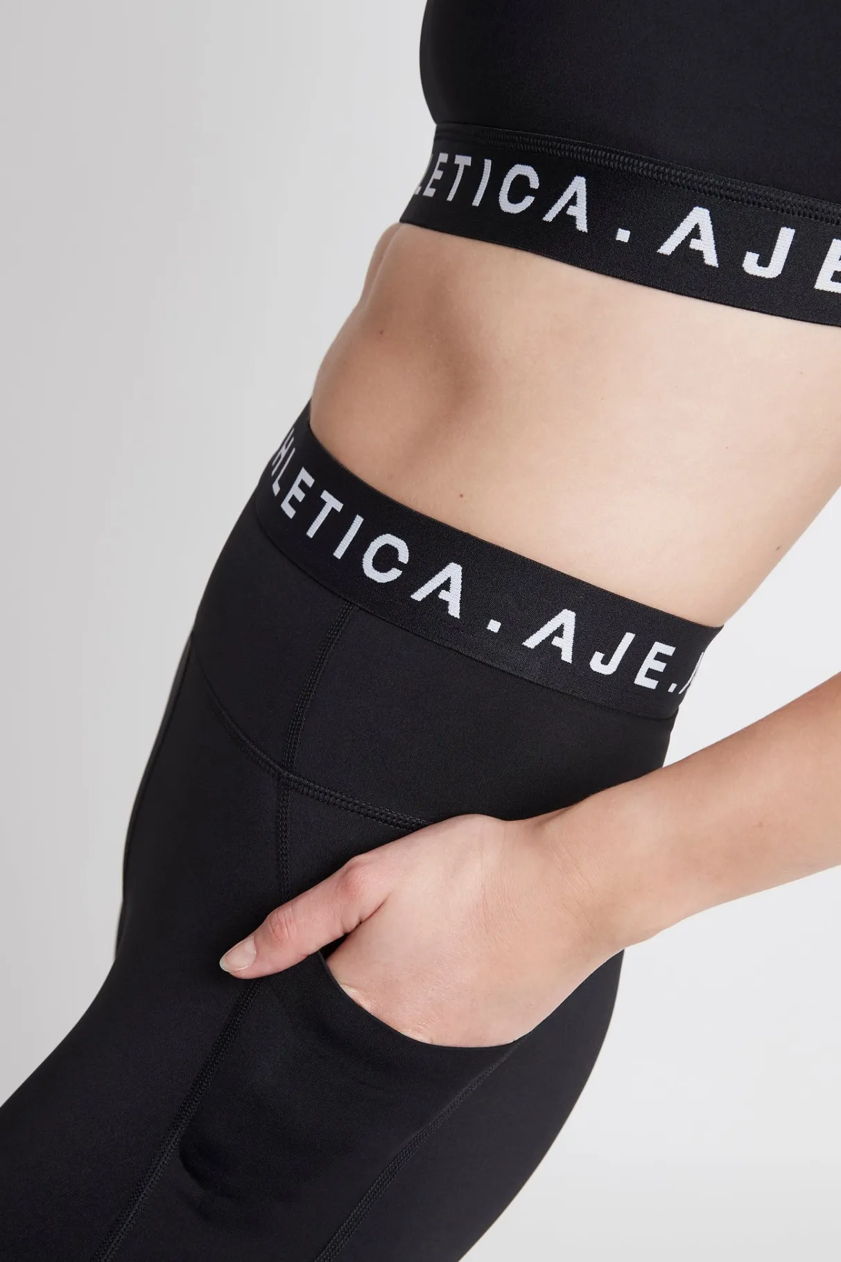 logotape_laser_cut_full_length_legging__3.webp Online Aje ATHLETICA Logotape Laser Cut Full Length Legging 208 Black/White