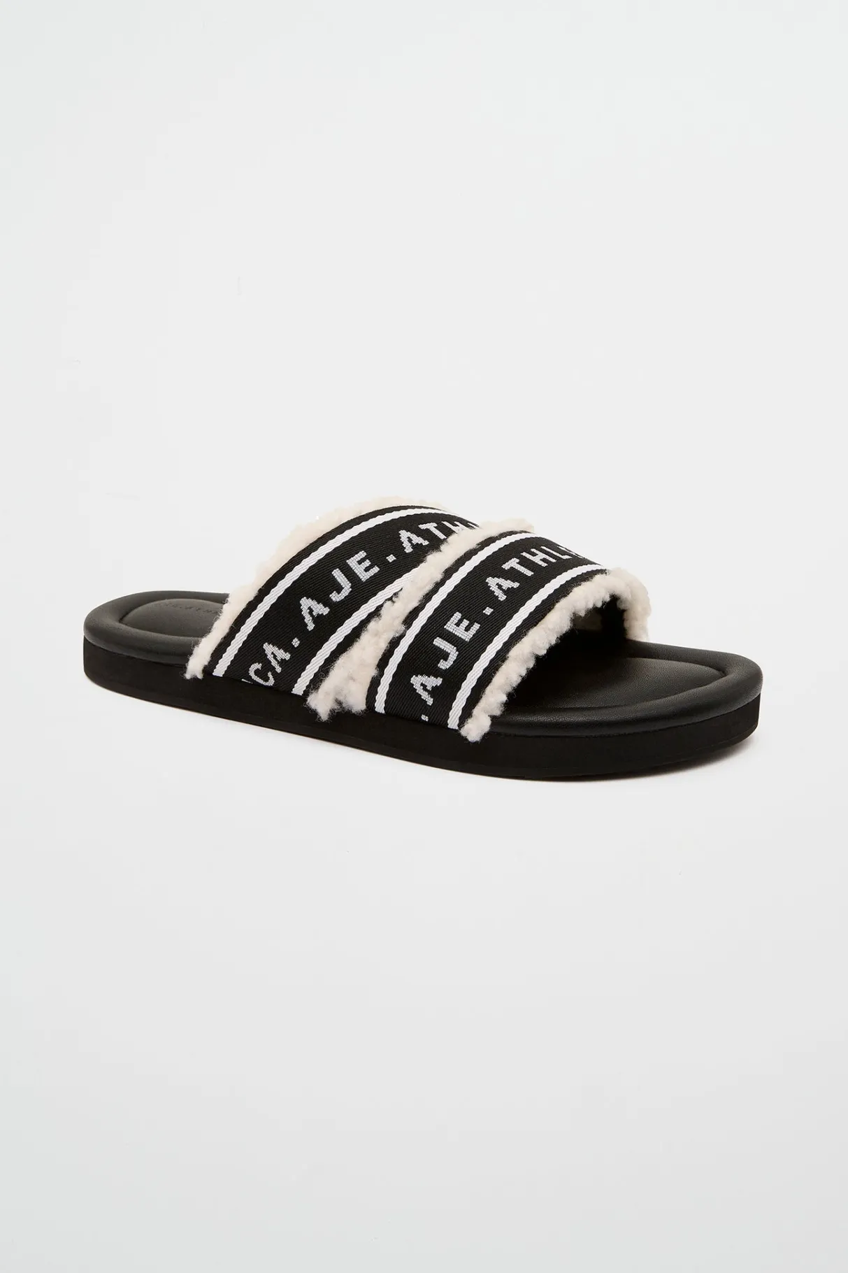 logotape_shearling_slides__1-1.webp Shop Aje ATHLETICA Logotape Shearling Slides 938 Black/White