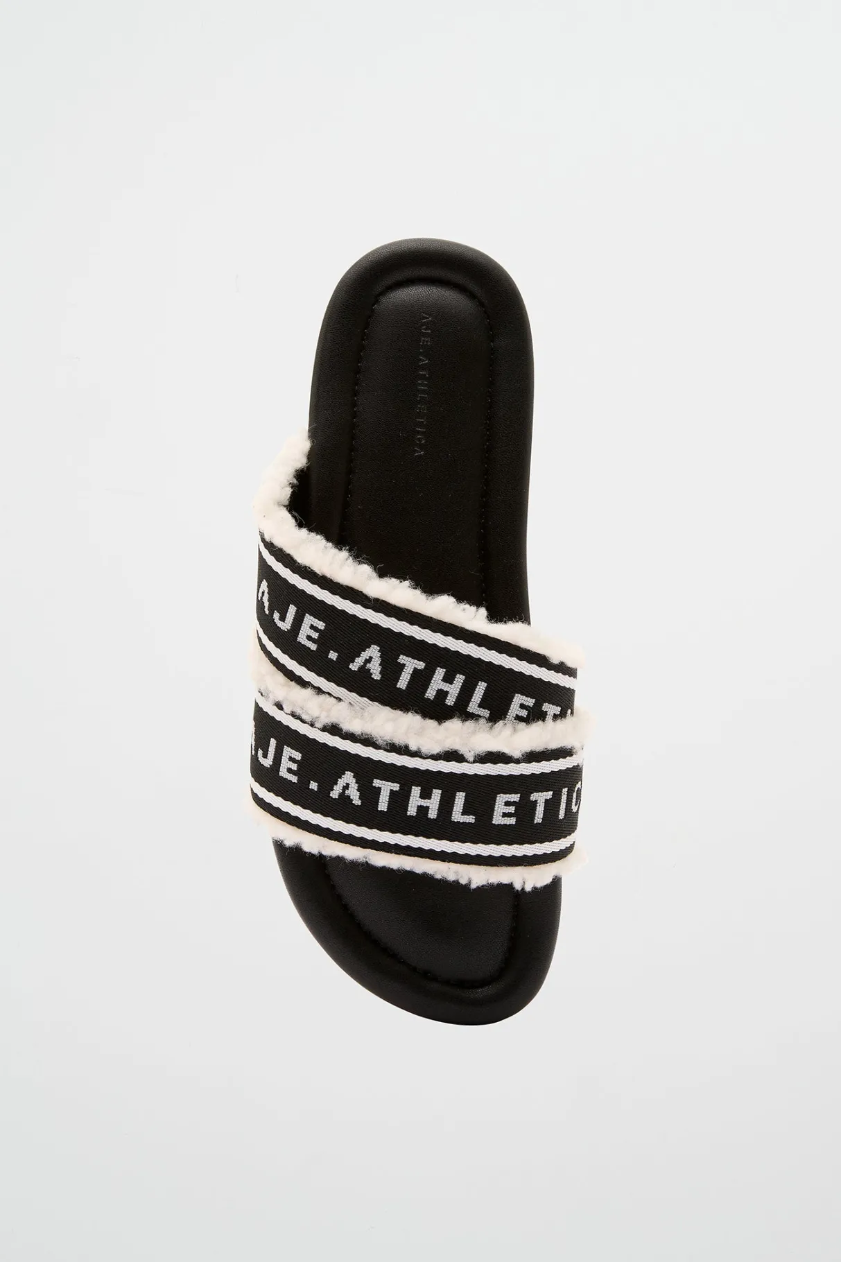 logotape_shearling_slides__2-1.webp Shop Aje ATHLETICA Logotape Shearling Slides 938 Black/White