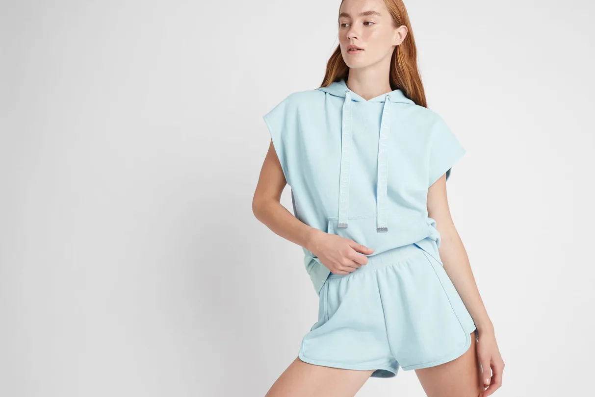 logotape_short_sleeve_hoodie__16.webp Online Aje ATHLETICA Logotape Short Sleeve Hoodie 403 Ice Blue