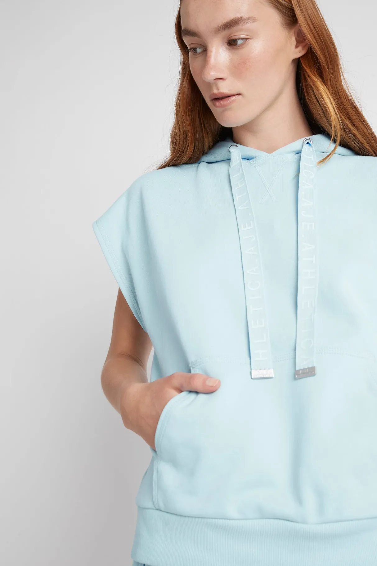 logotape_short_sleeve_hoodie__3.webp Online Aje ATHLETICA Logotape Short Sleeve Hoodie 403 Ice Blue