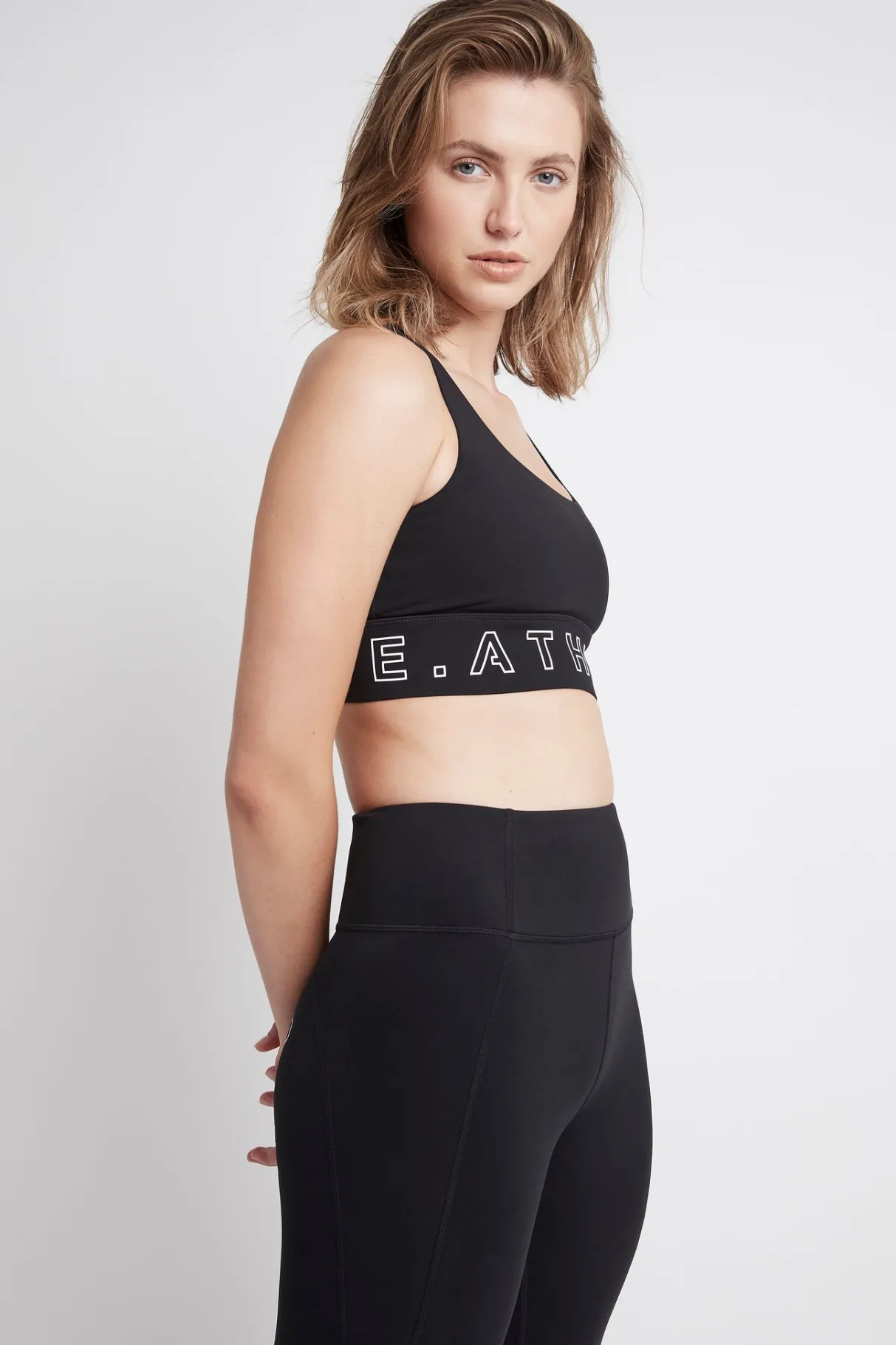 logotape_sports_bra__2.webp Online Aje ATHLETICA Logotape Sports Bra 310 Black/White