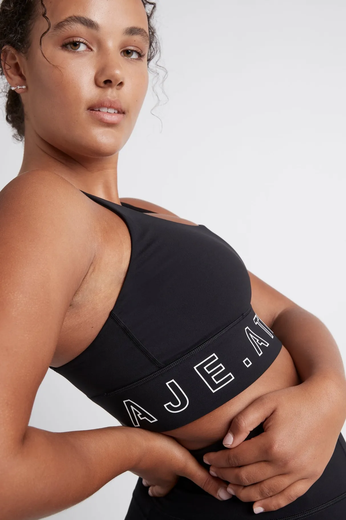 logotape_sports_bra__8.webp Online Aje ATHLETICA Logotape Sports Bra 310 Black/White