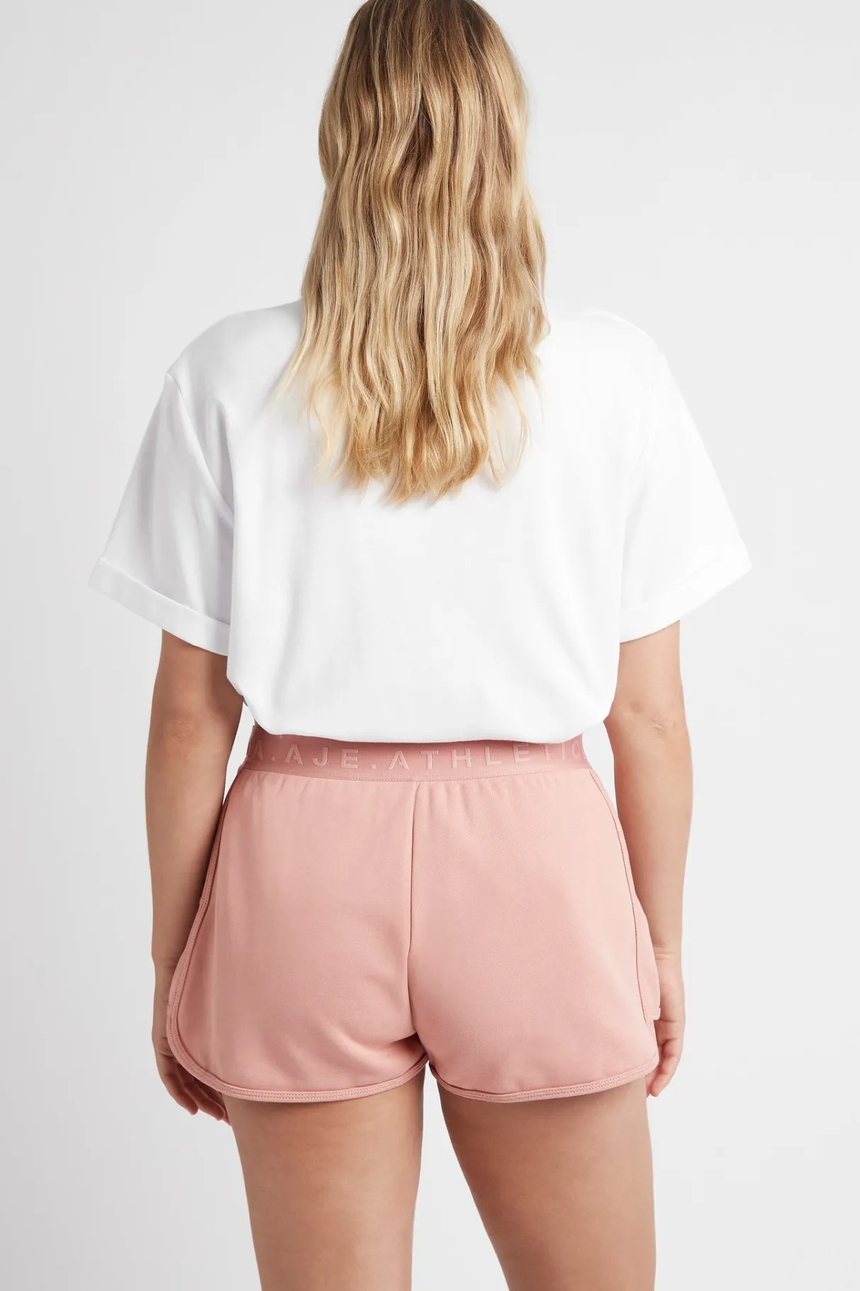 logotape_sweat_shorts__8-1.webp Shop Aje ATHLETICA Logotape Sweat Shorts 604 Sunset Pink