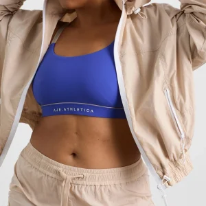 Shop Aje ATHLETICA Long Line Spray Jacket Latte Beige