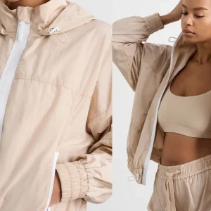 Shop Aje ATHLETICA Long Line Spray Jacket Latte Beige
