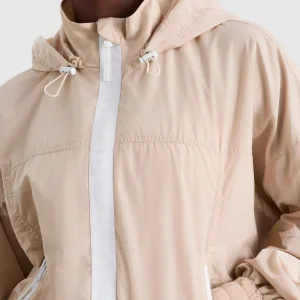 Shop Aje ATHLETICA Long Line Spray Jacket Latte Beige