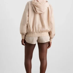 Shop Aje ATHLETICA Long Line Spray Jacket Latte Beige