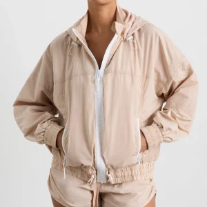 Shop Aje ATHLETICA Long Line Spray Jacket Latte Beige