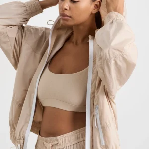Shop Aje ATHLETICA Long Line Spray Jacket Latte Beige