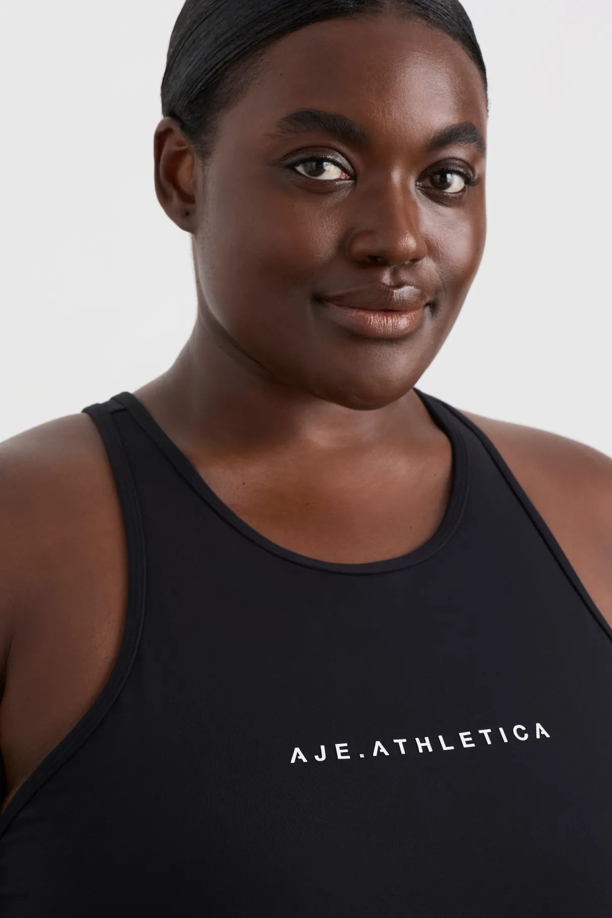 longline_racer_back_tank__11.webp Online Aje ATHLETICA Longline Racer Back Tank 135 Black