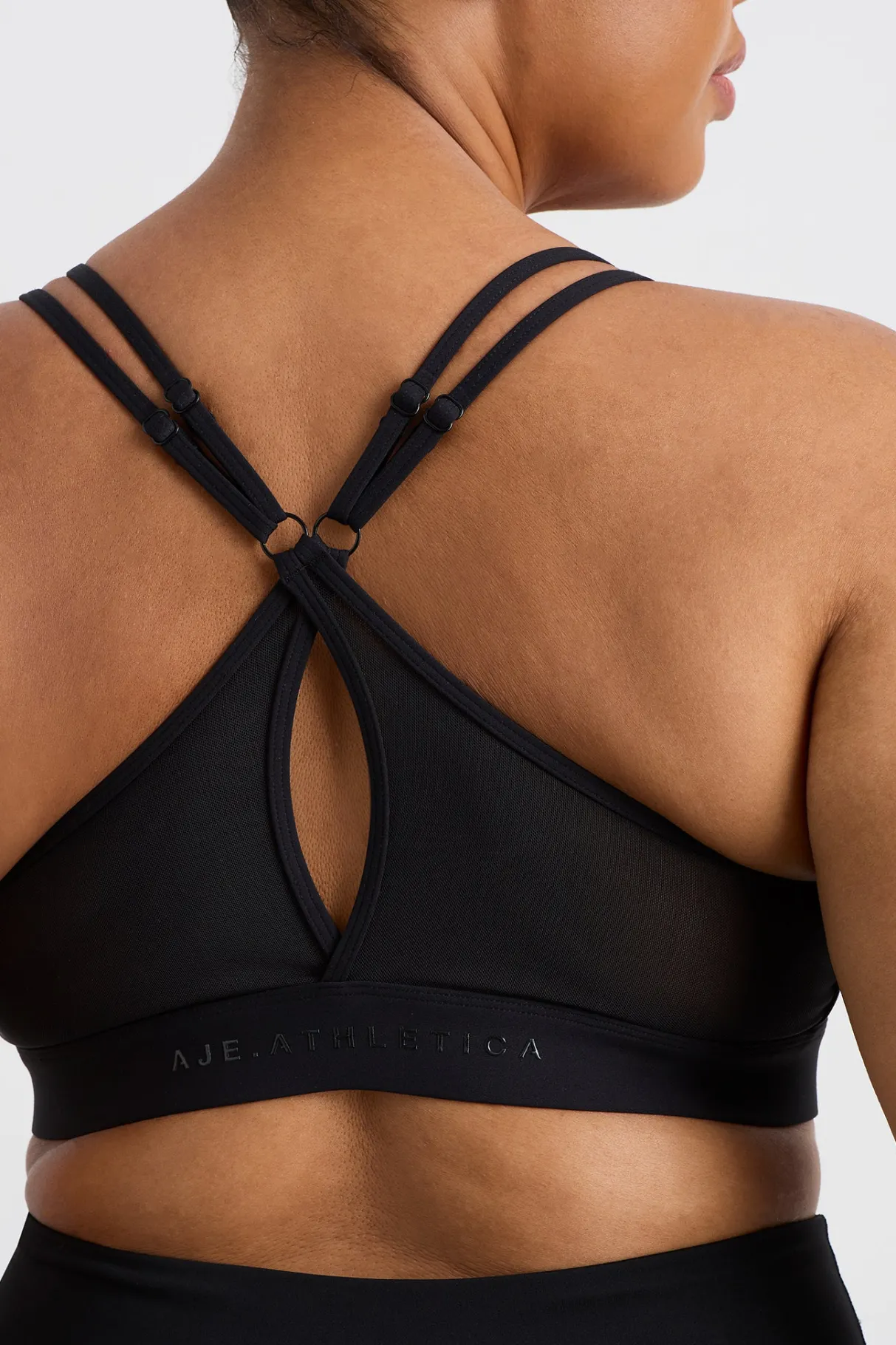 mesh_back_sports_bra__11-1.webp Fashion Aje ATHLETICA Mesh Back Sports Bra 338 Black