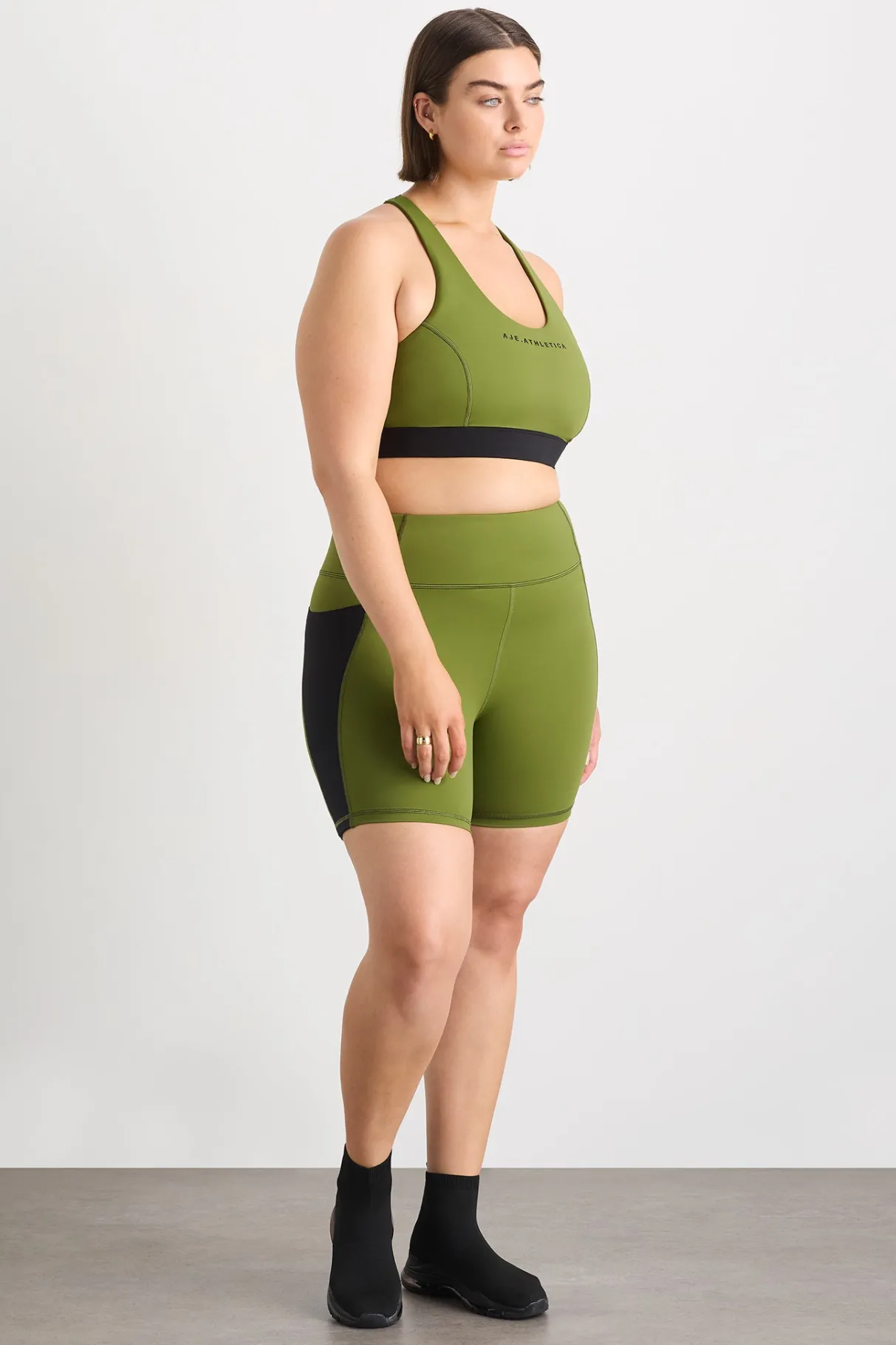 mid_length_bike_short__9.webp Sale Aje ATHLETICA Mid Length Bike Short 606 Evergreen Black