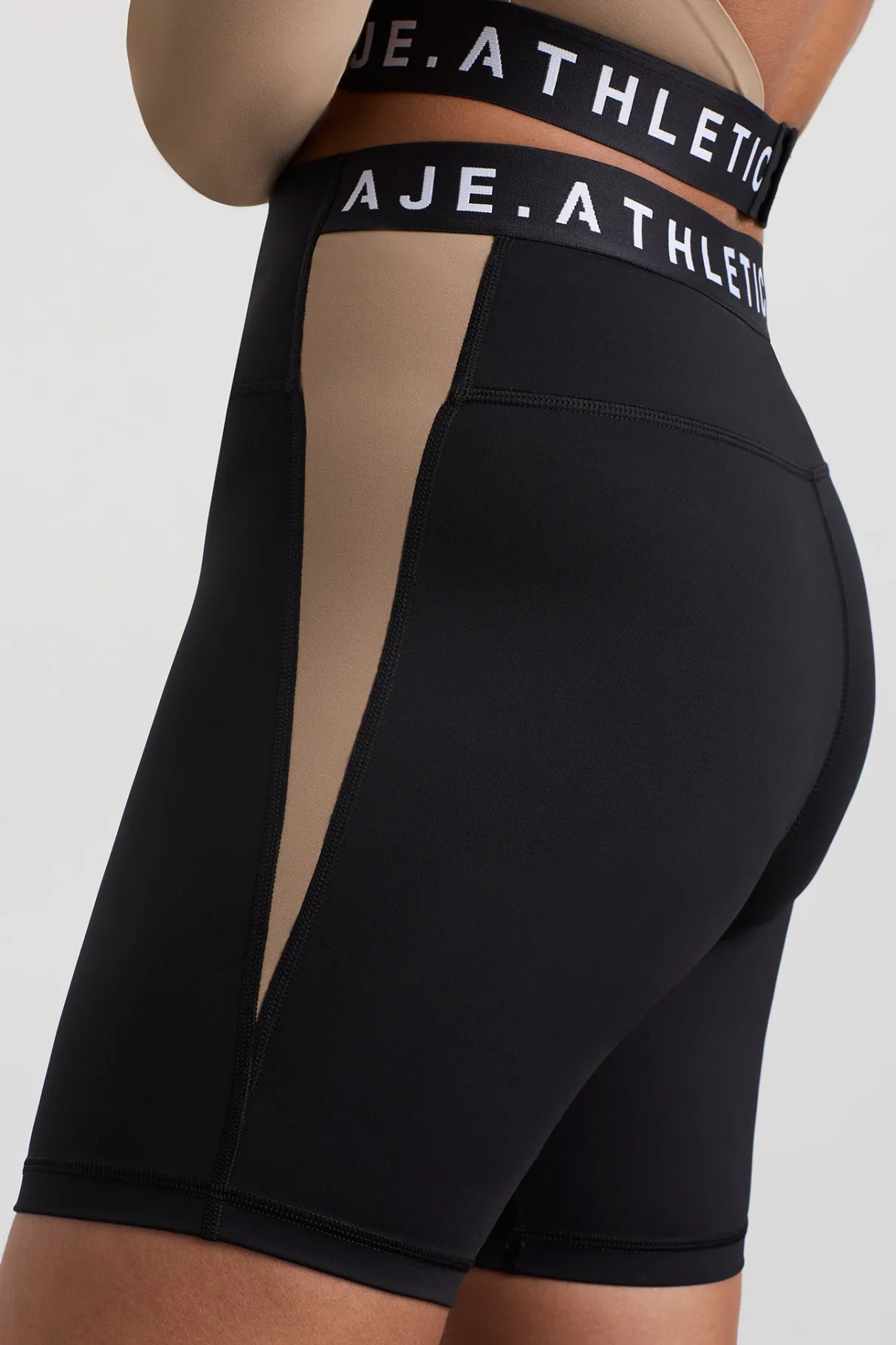 mid_length_logo_bike_short__7-1.webp Best Aje ATHLETICA Mid Length Logo Bike Short 250 Black/Dune
