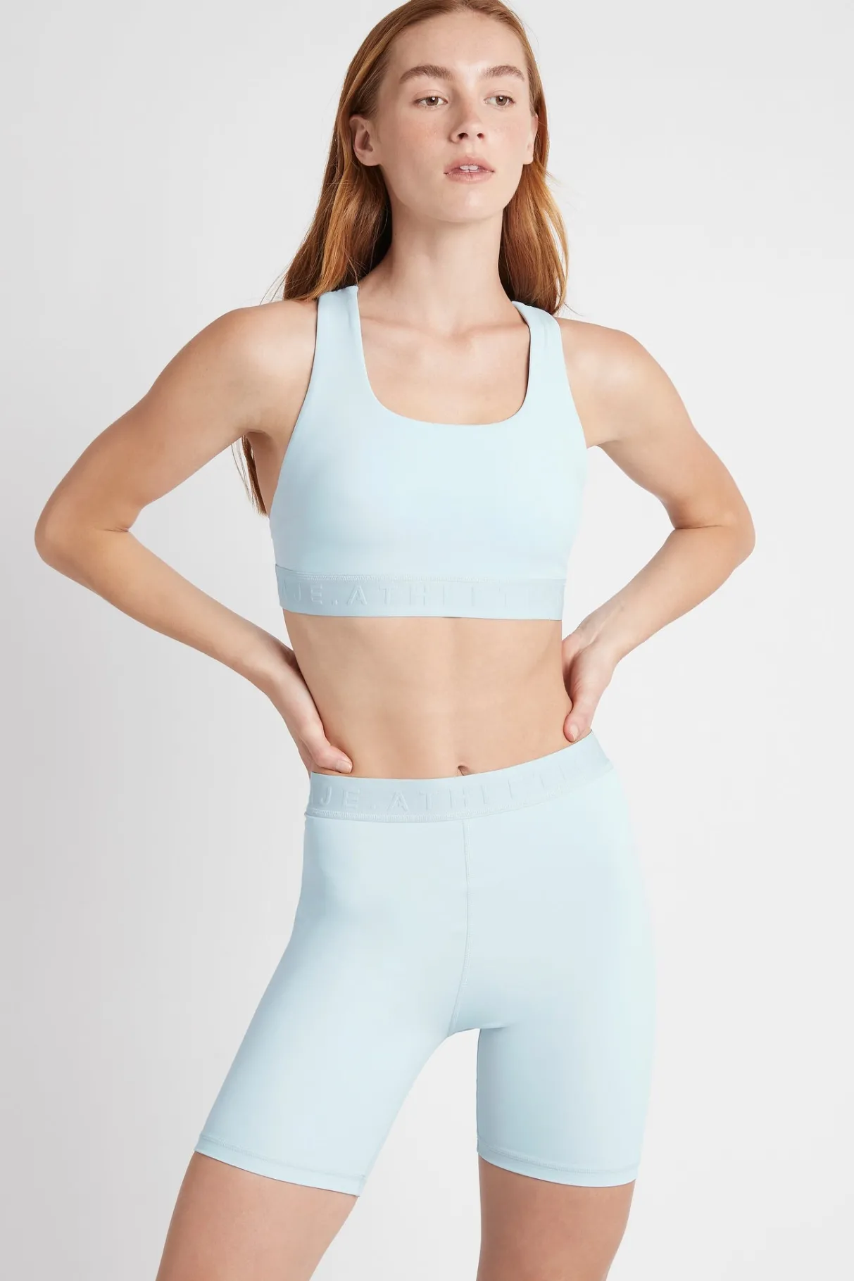 mid_rise_logotape_shorts__0.webp Fashion Aje ATHLETICA Mid Rise Logotape Shorts 607 Ice Blue