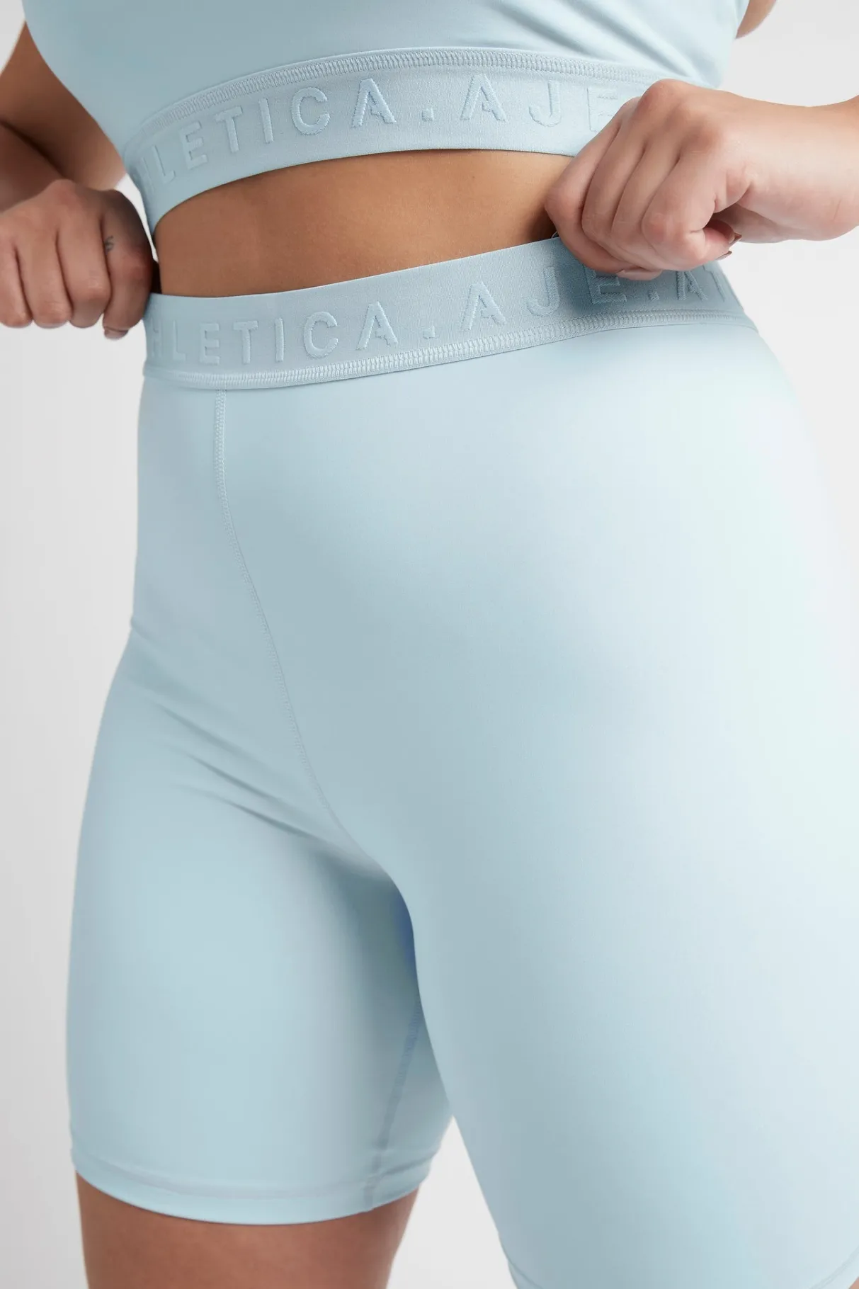 mid_rise_logotape_shorts__13.webp Fashion Aje ATHLETICA Mid Rise Logotape Shorts 607 Ice Blue