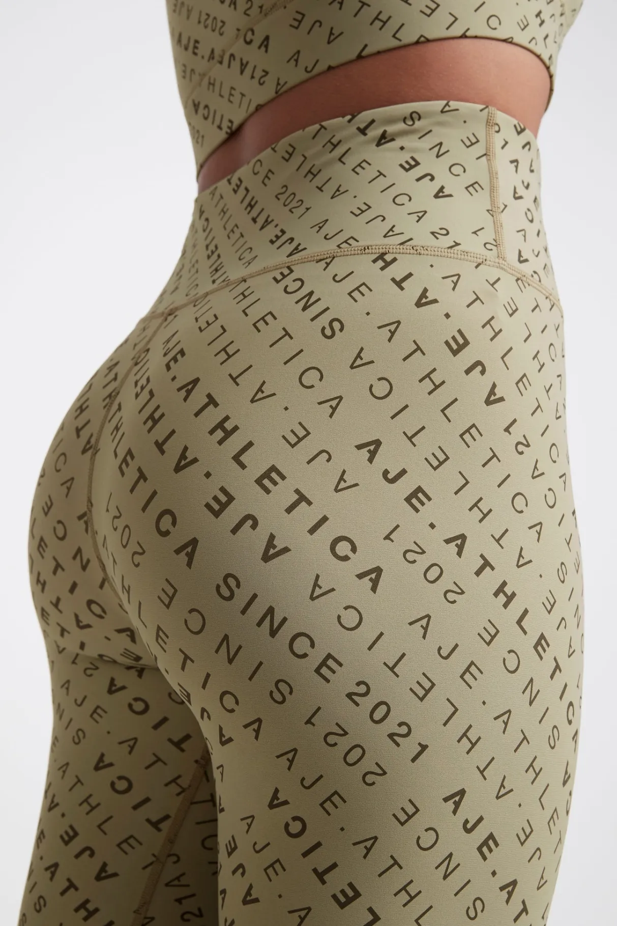 monogram_high_rise__legging__7.webp Shop Aje ATHLETICA Monogram High Rise 7/8 Legging 203 Sage/Forest Green