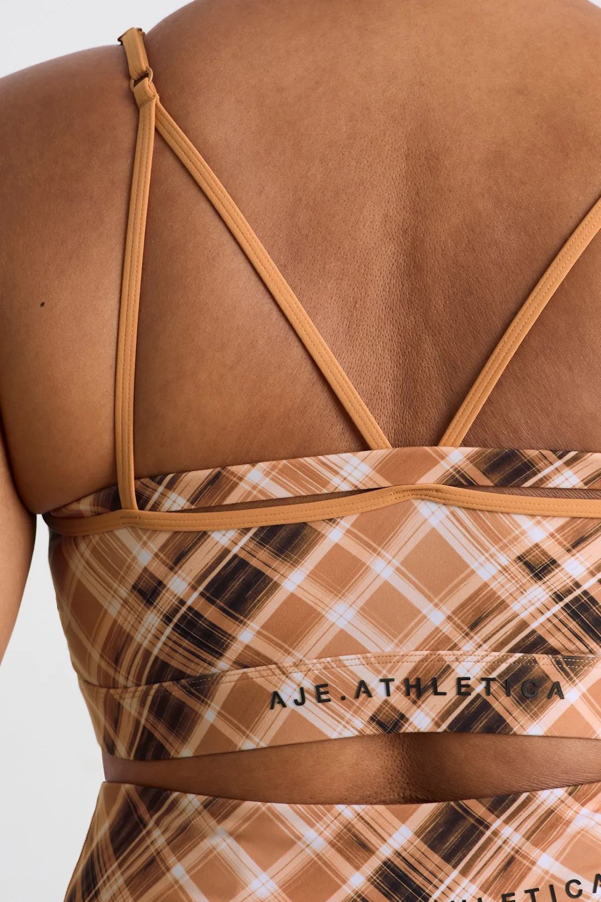 multi_strap_sports_bra__14.webp Shop Aje ATHLETICA Multi Strap Sports Bra 363 Blurred Tan Check