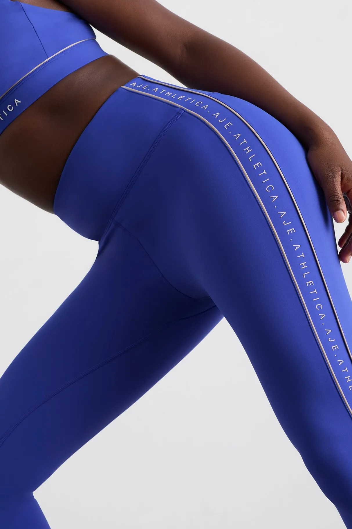 notch_logo__legging__4.webp Cheap Aje ATHLETICA Notch Logo 7/8 Legging 240 Marine Blue Latte Beige